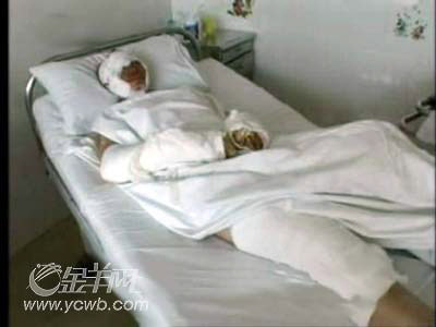 男子用玻璃片割毁妻子面容被刑拘(组图)