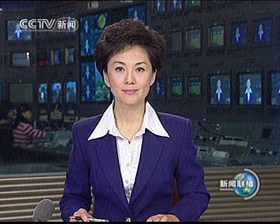 新闻联播男主播郭志坚笑容赢得好评(图)