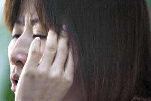 女子隆胸后胸部溃烂 有毒物质残留体内无法取出