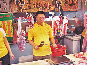 北大毕业生开百家猪肉连锁店 人称猪肉大王