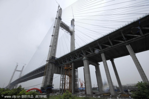 点击查看原图 上海闵浦大桥主桥合龙创三项国际纪录(组图)