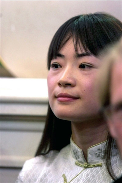 奥巴马与弟弟北京会面遭熊抱 中国弟媳认哥-奥巴马|熊抱|中国弟媳-东北网社会