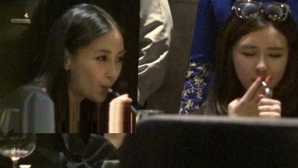 Angelababy参加聚会豪放抽烟 动作娴熟遭热议