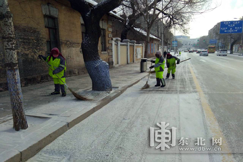 人机配合 安全作业 哈尔滨迎战2018年首场降雪