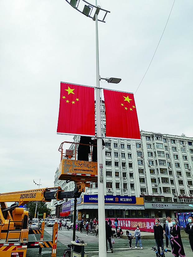 哈市58条街路装点国旗(图)-东北网哈尔滨-东北网