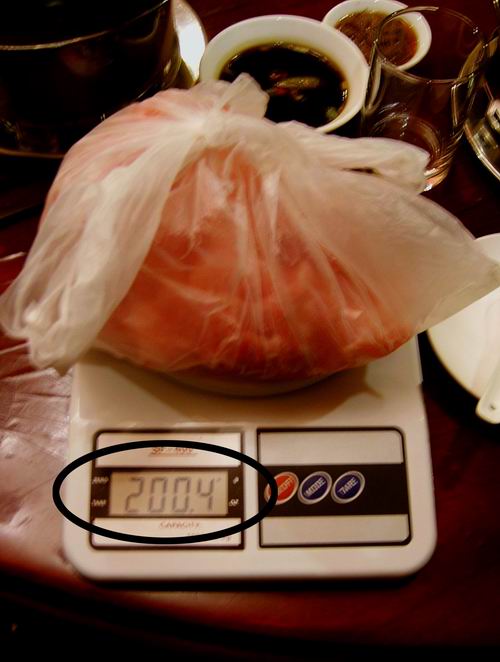 王子火锅店的猪里脊只有200克